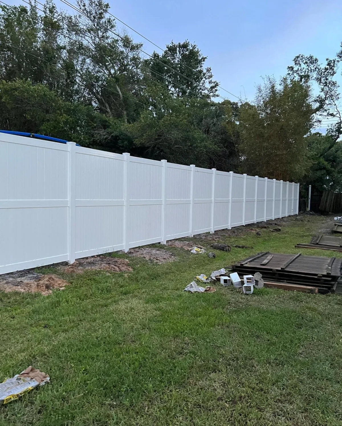 Vinyl privacy, white construction by Crystalline Home Improvement in Central Florida